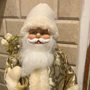 Elegant Gold and Cream Santa Figurine